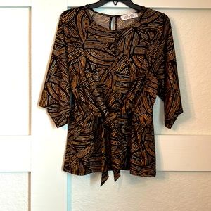 Kasper’s women’s tunic blouse.with front self tie. Size large, black & gold